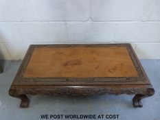 A carved Chinese coffee table