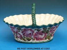 A large late 19thC / 20thC Wemyss basket decorated with roses, with impressed Weymss mark to base,