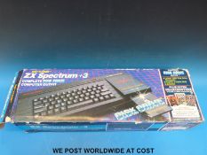 A Sinclair ZX Spectrum plus 3 disk drives, joystick,