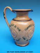 Doulton Lambeth jug decorated with the motto 'Straight is the line of duty,