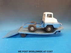 Three Tri-ang toys to include a crane with bucket,