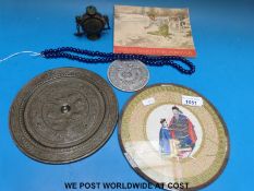 A collection of Chinese items to include a 19thC silk embroidery, metal snuff bottle pendant,