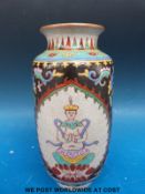 A Chinese crackle glazed vase decorated in enamels with six character mark to base (23cm tall)
