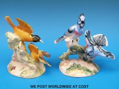 A Beswick Blue Jays and Orioles figure (13cm tall)
