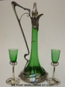 An Art Nouveau white metal mounted green glass ewer and two liqueur glasses,