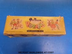 A Pelham poodle puppet in box