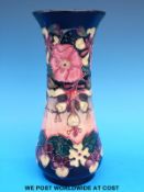 A Moorcroft pedestal vase flared vase decorated in the Oberon pattern (20cm tall)