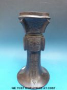 A Chinese 18th/19thC bronze Gu vase of flared form with decoration of auspicious symbols (20.