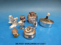A cloisonné owl together with a collection of pewter owls and small trinket boxes