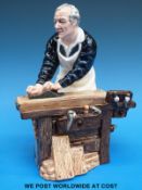 A Royal Doulton character figure The Carpenter HN2678