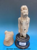 Two Egyptian antiquities, one of Sekhmet,