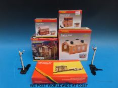 Five Hornby 00 gauge buildings comprising Engine Shed R8004; Signal Box R8534; Water Tower R8003;