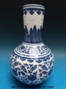 A Chinese Kangxi style blue and white bottle vase with seal mark to base (20.