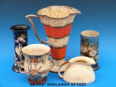 A collection of Art Deco pottery including a Wade jug,