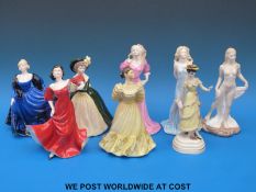 A collection of eight large Coalport figurines