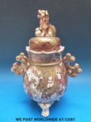 A Japanese Satsuma koro with top decorated with a foo dog with a ball and figures to the body (29.