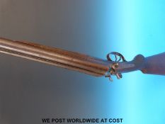 Unnamed 12 bore double barrelled side by side hammer action shotgun with engraving to the side