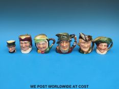 Six Royal Doulton character jugs including Rip van Winkle,