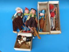 Boxed and loose Pelham puppets including a dog and clowns