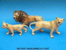A Beswick group of three lions