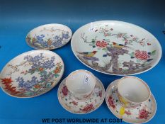 A large 19thC Chinese charger depicting birds and chrysanthemums (36cm diameter),