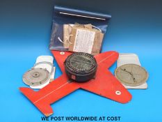 An H Hughes & Son Ltd Mk X aircraft compass mounted on a cut out of an aircraft together with a