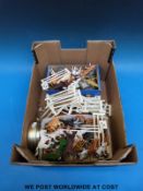 A collection of Britains and other farm and zoo animals including a wooden zoo pen