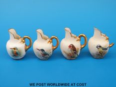 Four Royal Worcester miniature flatback jugs hand decorated with birds, two signed (3.