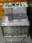 A Plessey type 2250B radio together with a DC power supply and a signal generator