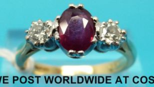 An 18ct gold ring set with an oval ruby of approximately 1.