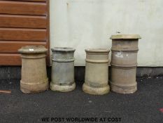 Four chimney pots (largest 61cm tall)