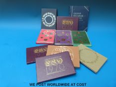 Eleven various UK coin sets