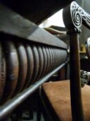 A 19thC octagonal table with under-shelf, an oval table with rope twist legs and a Seth Thomas,