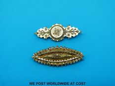 Two yellow metal gold brooches with filigree and ball design, one marked 15ct (9.