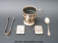 A hallmarked silver christening cup etc.