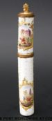 An 18th / 19thC French enamel cylindrical perfume bottle case with gilt stopper and decoration of