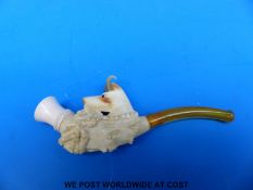 A Meerschaum pipe/cigarette holder in the form of a chamois,