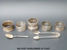 Five various silver hallmarked napkin rings,