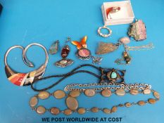 A silver necklace, quartz pendant, silver and pressed amber brooch, citrine pendant,