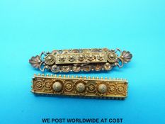 Two yellow metal brooches marked 15ct with filigree and ball design