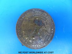 A Tiffany Studio New York Coca Cola brass buckle inscribed verso 