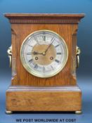 An oak cased two train clock Rowell and Harris Oxford to dial with French movement by CH Vene reg.