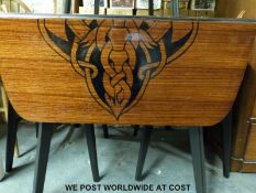 A retro G plan table and four chairs circa 1957