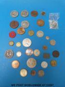 A collection of various tokens including 1793 Lady Godiva Coventry token, college tokens,