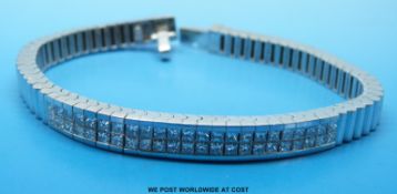 An 18ct white gold bracelet set with 46 princess cut diamonds