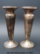 A pair of hallmarked silver vases (height 15.