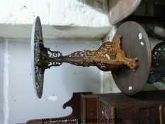 A cast iron pub table with pierced iron top (H70cm)