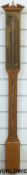 A Terricelli oak stick barometer