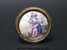 An 18thC English Bilston enamel circular cloak pin or chimney piece knob polychrome decorated with