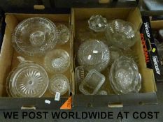 A large collection of glassware including a plated whisky noggin, coloured glass,